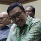 Menpora Imam Nahrawi (kanan) jelang memberi kesaksian pada sidang lanjutan suap dana hibah untuk KONI dengan terdakwa Deputi IV Bidang Peningkatan Prestasi Kemenpora, Mulyana serta Adhi Purnomo dan Eko Triyanta di Pengadilan Tipikor, Jakarta, Kamis (4/7/2019). (Liputan6.com/Helmi Fithriansyah)