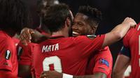 Ekspresi Fred setelah mencetak gol untuk Manchester United pada laga Liga Europa kontra Club Brugge di Old Trafford, Jumat (28/2/2020) dini hari WIB. (AFP/Oli Scarff)