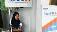 Koni Aturrohmah, agen BRILink milik PT Bank Rakyat Indonesia (Persero) Tbk atau BRI. foto: Istimewa