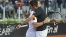 Francesco Totti berpasangan dengan petenis no. 1 dunia Novak Djokovic. (www.asroma.it)