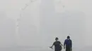 Kebakaran hutan yang terjadi di Riau menyebabkan Singapura terkena kabut asap, Selasa (29/9/2015). Badan Lingkungan Hidup Nasional Singapura meningkatkan level kabut asap menjadi sangat tidak sehat (REUTERS/Edgar Su)