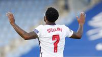 Raheem Sterling - Bomber Manchester City ini merupakan pemain mampu menunjukan kualitas terbaiknya saat membela klub maupun negaranya. Berkat permainan apiknya, ia berhasil membawa City ke final Liga Champions dan Timnas Inggris ke final Euro 2020. (Foto:AP/Brynjar Gunnarson)