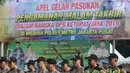 Aparat kepolisian saat mengikuti apel gelar pasukan pengamanan malam takbiran di Lapangan Silang Monas, Jakarta Pusat, Selasa (4/6/2019). Polres Jakarta Pusat menurunkan lima ribu personel kepolisian untuk mengamankan malam takbiran. (merdeka.com/Imam Buhori)