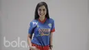 Gadis ini merupakan penggemar klub sepakbola Arema Malang. (Bola.com/M Iqbal Ichsan)