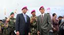  Wakil Presiden Indonesia ke-6, Try Sutrisno (kanan) hadir dalam upacara pengangkatan Menhan Ryamizard Ryacudu menjadi warga kehormatan Korps Marinir di Lapangan Apel Kesatrian Marinir, Cilandak, Jakarta (9/12/2014). (Liputan6.com/Helmi Fithriansyah)