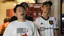Ekspresi sejumlah pendukung MU saat acara Roaring Night antara Manchester United melawan West Ham di Pitch 98, Kemang, Jakarta, Minggu (04/02/2024) malam WIB. (Bola.com/Abdul Aziz)