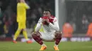 <p>Laga tuntas 3-3 setelah The Gunners sempat tertinggal 1-3. (AP Photo/Kirsty Wigglesworth)</p>