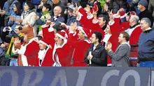 Suasana para suporter ketika menyaksikan tim mereka bertanding pada periode Boxing Day. (AS. 