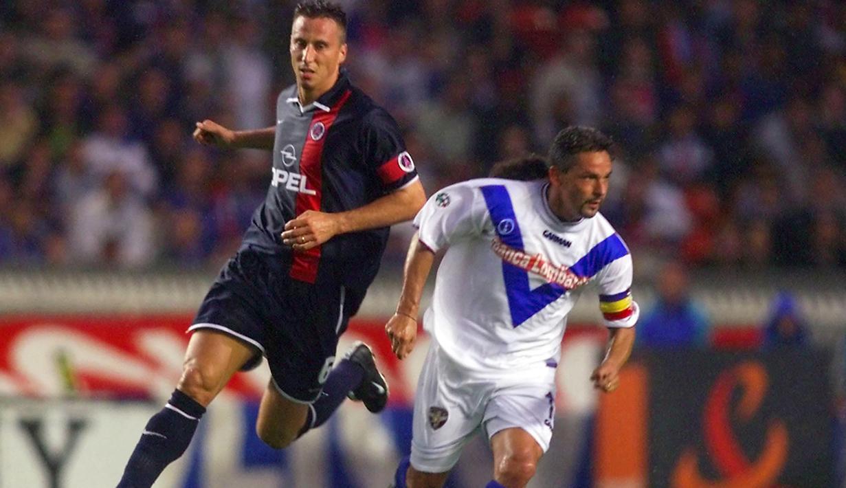 Roberto Baggio. Striker Italia yang telah pensiun bersama Brescia pada Mei 2004 ini total mencetak 68 gol dari eksekusi penalti di Serie A Liga Italia. Ia melakukannya pada 1985 hingga 2004 bersama Fiorentina, Juventus, AC Milan, Bologna, Inter Milan dan Brescia. (AFP/Jean-Loup Gautreau)