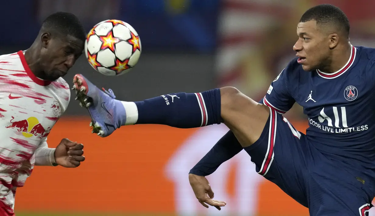 Penyerang Paris Saint Germain (PSG) Kylian Mbappe berebut bola dengan bek RB Leipzig Nordi Mukiele pada matchday keempat Grup A Liga Champions di Sheriff Stadium, Kamis dinihari WIB (4/11/2021). PSG harus puas dengan skor imbang 2-2. (AP Photo/Michael Sohn)