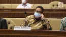 Ketua Bawaslu Rahmat Bagja saat mengikuti rapat kerja dengan Komisi II DPR RI di Kompleks Parlemen Jakarta, Rabu (13/4/2022). Raker tersebut membahas persiapan pemilu serentak pada 2024. (Liputan6.com/Angga Yuniar)