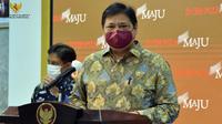 Menteri Koordinator Bidang Perekonomian Airlangga Hartarto menyampaikan  kebijakan Pemberlakuan Pembatasan Kegiatan Masyarakat (PPKM) pada 11-25 Januari 2021 di Kantor Presiden, Jakarta, Senin (11/1/2021). (Biro Pers Sekretariat Presiden)