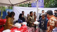 Menteri Imigrasi dan Pemasyarakatan Agus Andrianto saat memimpin bakti sosial Kementerian Imipas. Foto: Liputan6.com/ Humas Kementerian Imipas