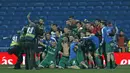 Para pemain Leganes merayakan keberhasilan mencapai semifinal usai mengalahkan Real Madrid pada perempat final Copa del Rey di Santiago Bernabeu stadium, Madrid, (24/1/2018). Leganes menang 2-1. (AP/Francisco Seco)
