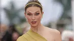 Karlie Kloss berpose untuk fotografer saat menghadiri Festival Film Cannes 2023, Cannes, Prancis selatan, Kamis, 18 Mei 2023.(Photo by Vianney Le Caer/Invision/AP)