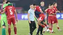Pelatih Timnas Indonesia John Herdman tersenyum bangga usai membawa timnya menjadi juara FIFA ASEAN Cup 2026 di Stadion Utama Gelora Bung Karno (SUGBK), Jakarta, Minggu (5/10/2026). (KLY/Budy Santoso)