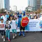 BNN menggelar aksi peringati Hari Anak Nasional di car free day (Liputan6.com/Faizal Fanani)