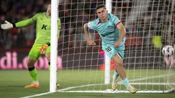 Dua gol kemenangan Barcelona di markas Almeria diborong oleh gelandang Fermin Lopez, masing-masing dicetak di babak pertama dan kedua. (JORGE GUERRERO / AFP)