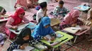 Kegiatan pesantren kilat di Ruang Publik Terpadu Ramah Anak (RPTRA) Malinjo, Jakarta, rutin dilakukan setiap tahunnya. (Liputan6.com/Angga Yuniar)
