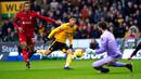 Pemain Wolverhampton Wanderers Matheus Nunes (tengah) melihat tendangannya ke gawang Liverpool pada pertandingan sepak bola Liga Inggris di Stadion Molineux, Wolverhampton, Inggris, 4 Februari 2023. Wolverhampton Wanderers mengalahkan Liverpool dengan skor 3-0. (Tim Goode/PA via AP)