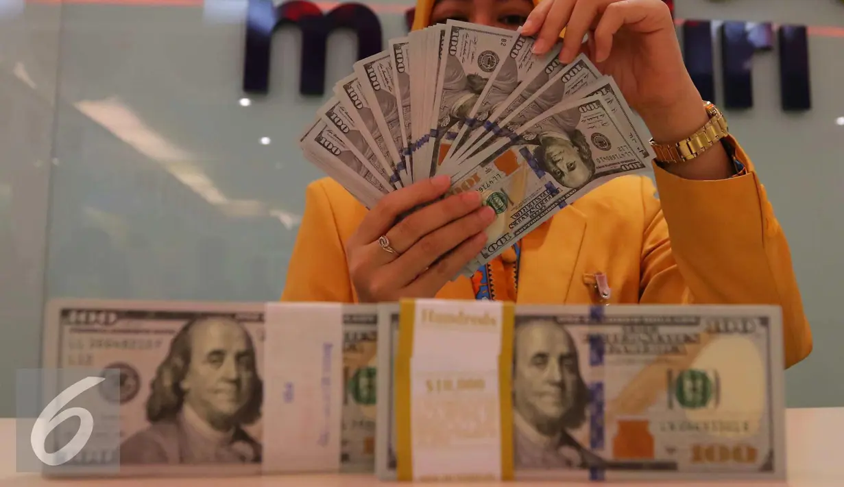 Dolar AS langsung naik dan mencapai level tertingginya pagi ini di Rp 13.150. (Liputan6.com/Angga Yuniar)