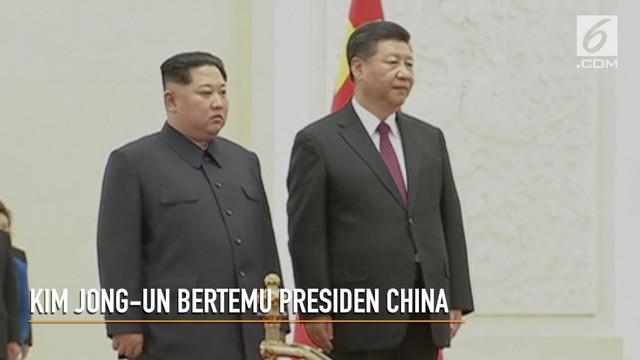 Jabatan tangan bersejarah, antara Kim Jong-Un dengan Presiden China.