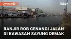 Banjir rob menggenangi jalan di Sayung, Demak, Minggu (29/9/2024) pagi. Ketinggian banjir di wilayah tersebut bervariasi, antara 20 hingga 30 cm