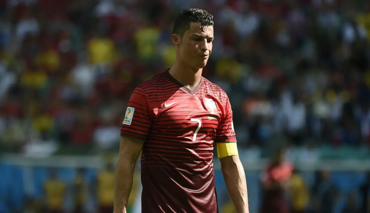 Sempat sesumbar akan melibas Jerman saat preskon. Justru Portugal yang dilindas Jerman tanpa ampun. Di lapangan CR7 seperti tak berdaya, Senin (16/6/2014) ( AFP Photo/ODD ANDERSEN)