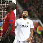 Striker Manchester United, Romelu Lukaku, tampak kecewa usai gagal membobol gawang Valencia pada laga Liga Champions di Stadion Old Trafford, Selasa (2/10/2018). Manchester United ditahan 0-0 oleh Valencia. (AP/Jon Super)