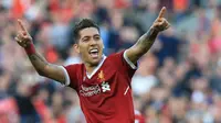 Mantan pemain Liverpool, Dirk Kuyt, terkesan dengan penampilan Roberto Firmino yang sejauh ini tampil tajam bersama klub asal Merseyside tersebut. (AFP/Lindsey Parnaby)