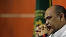Gulat Medali Emas Manurung saat menjalani sidang lanjutan kasus suap alih fungsi hutan di Riau, Senin (29/12/14). (Liputan6.com/Miftahul Hayat)
