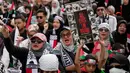 Pengunjuk rasa mendesak Amerika Serikat menghentikan bantuan kepada Israel. (AP Photo/Achmad Ibrahim)