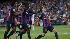 Gelandang Barcelona, Gavi (kanan) berselebrasi setelah mencetak gol ke gawang Mallorca pada pertandingan La Liga Spanyol di stadion Camp Nou di Barcelona, Spanyol, Minggu, 28 Mei 2023. (AP Photo/Joan Monfort)