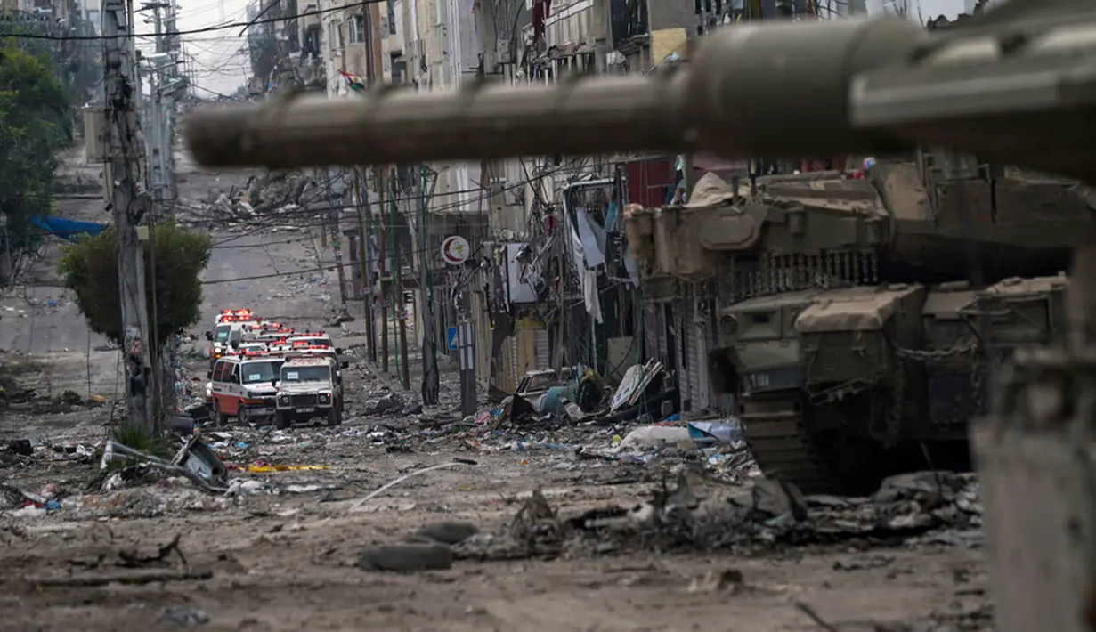 <p>Israel melancarkan serangan pertamanya ke Jalur Gaza pada bulan lalu untuk memusnahkan Hamas. Mereka menyisir setiap bangunan untuk mencari persembunyian Hamas. (AP Photo/Victor R. Caivano)</p>