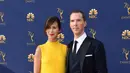 Sophie sendiri hadir di Emmy dengan gaun yang simpel dan klasik bersama dengan Benedict Cumberbatch. (VALERIE MACON / AFP)