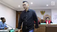 Mantan anggota DPRD DKI Jakarta, Mohamad Sanusi usai menjalani sidang lanjutan Peninjauan Kembali (PK) di PN Jakarta Pusat, Rabu (25/7/2018). Pada persidangan ini kuasa hukum pemohon membacakan kesimpulan pengajuan PK. (Liputan6.com/Helmi Fithriansyah)