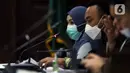 Terdakwa suap dan tindak pidana pencucian uang terkait pengurusan fatwa Mahkamah Agung untuk Djoko S Tjandra, Pinangki Sirna Malasari saat sidang di Pengadilan Tipikor Jakarta, Senin (7/12/2020). Sidang mendengar keterangan saksi, salah satunya Andi Irfan Jaya. (Liputan6.com/Helmi Fithriansyah)
