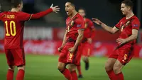 Youri Tielemans dari Belgia merayakan setelah mencetak gol pembuka selama pertandingan sepak bola UEFA Nations League antara Belgia dan Denmark di stadion King Power di Leuven, Belgia, Rabu, 18 November 2020. (AP Photo / Francisco Seco)