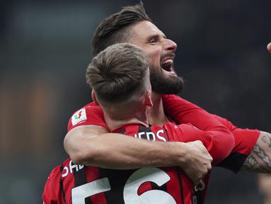 AC Milan berhasil menyingkirkan tamunya Genoa yang kini diarsiteki legenda AC Milan, Andriy Shevchenko di babak 16 besar Coppa Italia, Kamis (13/1/2022). Sempat tertinggal, Rossoneri comeback dan memukul balik Genoa 3-1 melalui babak perpanjangan waktu. (LaPresse via AP/Spada)