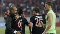 Selebrasi Thomas Muller setelah mencetak dua gol di Yunani. Bayern Muenchen menang 3-0 atas Olympiakos. ( REUTERS/Alkis Konstantinidis)
