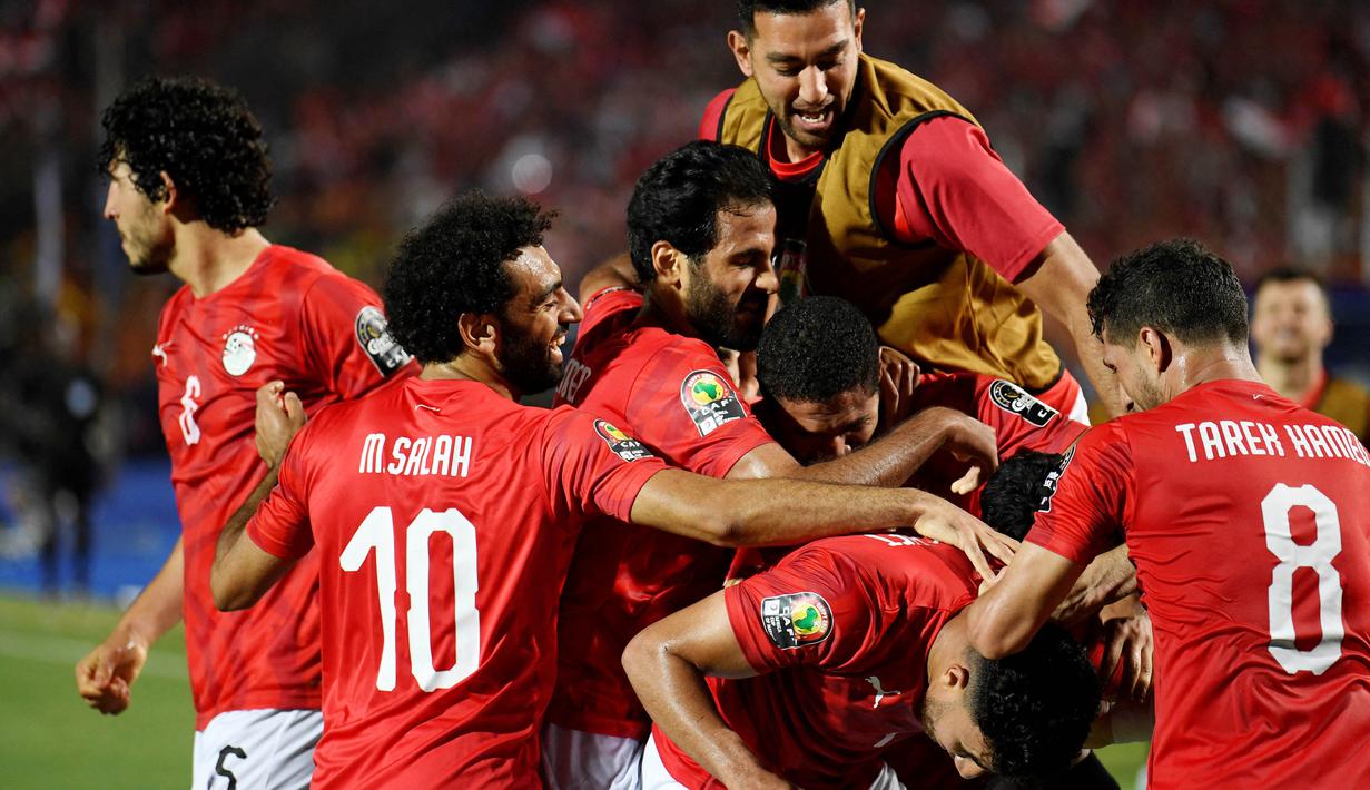 The Pharaohs masih menjadi tim tersukses di Piala Afrika dengan torehan tujuh trofi. Mesir menjadi jawara pada edisi 1957, 1959, 1986 , 1998, serta juara tiga kali berturut-turut pada 2006 , 2008, dan 2010. (AFP/Khaled Desuki)