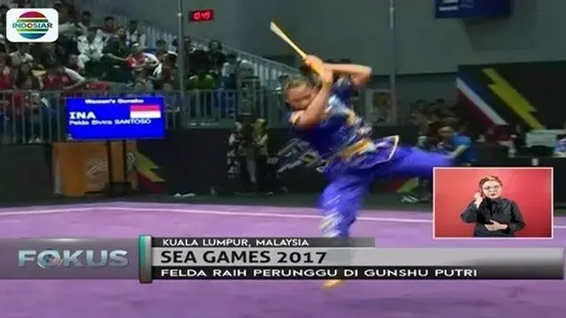 Atlet wushu putri Indonesia meraih medali perunggu dengan penampilan yang memukau.