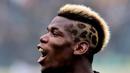 Setelah Batman, Paul Pogba memilih membentuk rambutnya seperti loreng kuda zebra. (AFP/Giuseppe Cacace)