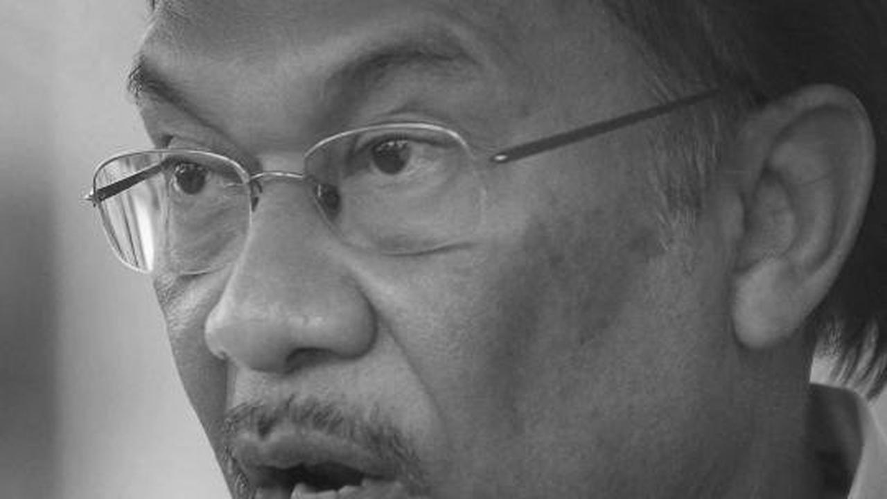 Potret wajah pemimpin oposisi Malaysia Anwar Ibrahim