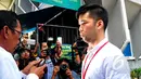 Pelaku penabrak maut di Pondok Indah, Christopher Daniel, hadiri sidang dengan agenda putusan sela di PN Jakarta Selatan, Senin (25/5/2015). Christopher didampingi kuasa hukumnya bungkam saat ditanya wartawan mengenai kasusnya. (Liputan6.com/Yoppy Renato)