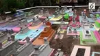 Sebuah tempat pemakaman umum di Jawa Tengah, disulap dengan cat warna-warni agar tidak bernuansa seram.