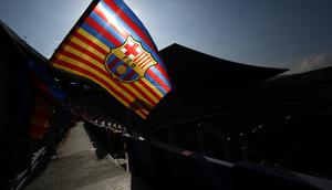 Logo dan ilustrasi Barcelona. (AFP/Pau Barrena)
