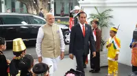 Jokowi menyambut Perdana penteri India (Liputan6.com/Hanz Jimenz Salim)