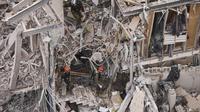 Militer Israel mengonfirmasi bahwa rudal-rudal tersebut diluncurkan langsung dari wilayah Iran. (AP/Oded Balilty)