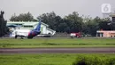 Sebuah pesawat parkir di Apron Bandara Pondok Cabe, Pamulang, Tangerang Selatan, Banten, Rabu (29/12/2021). Kementerian Perhubungan menunjuk Bandara Pondok Cabe dan Bandara Soekarno-Hatta sebagai bandara pengganti selama revitalisasi Bandara Halim Perdanakusuma. (Liputan6.com/Faizal Fanani)